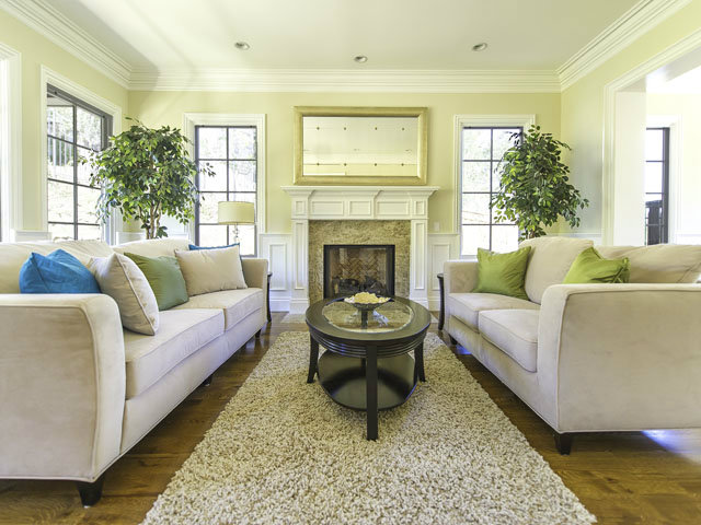 40 Bates Road Hillsborough, CA 94010 - Photo 5 of 17 a living room with furniture and a fireplace