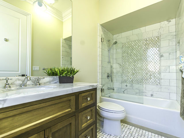 40 Bates Road Hillsborough, CA 94010 - Photo 10 of 17 a bathroom with a sink a toilet and a bathtub