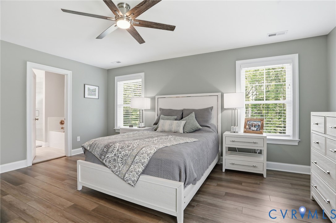 12040 Kenton Ridge Road Ashland, VA 23005 - Photo 35 of 54 Bedroom featuring wood-finish flooring, a ceiling