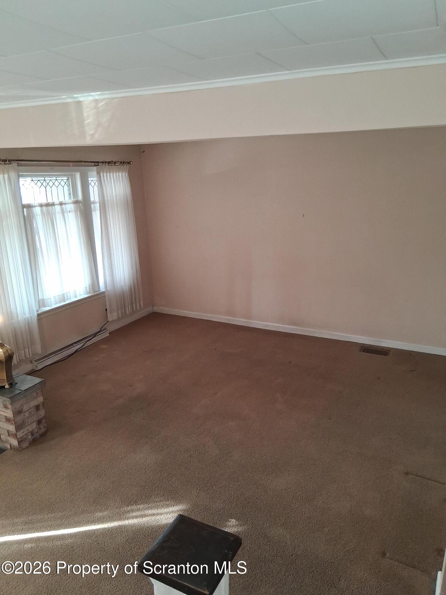 72 Welles Street Forty Fort, PA 18704 - Photo 11 of 37 a view of an empty room and window