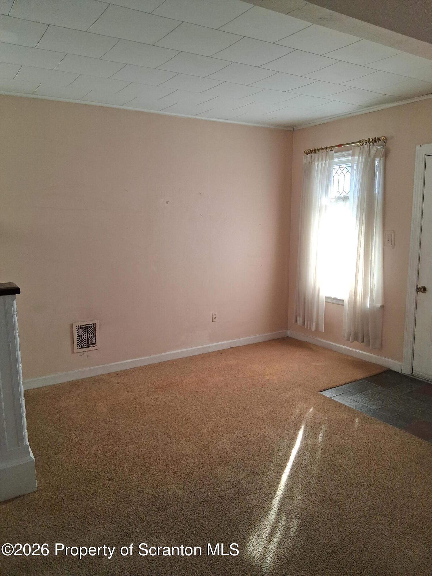 72 Welles Street Forty Fort, PA 18704 - Photo 13 of 37 an empty room with windows