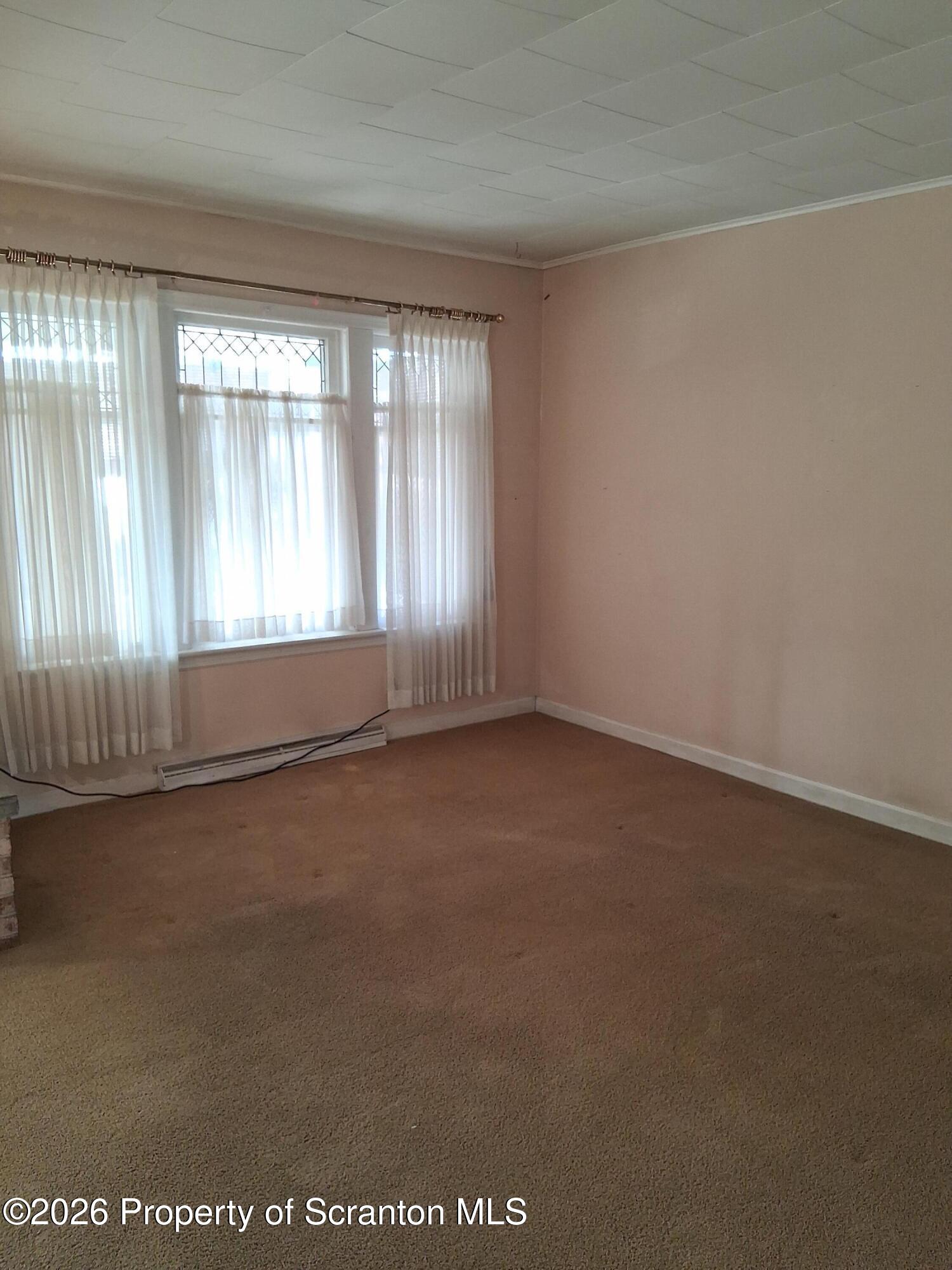 72 Welles Street Forty Fort, PA 18704 - Photo 15 of 37 an empty room with a window