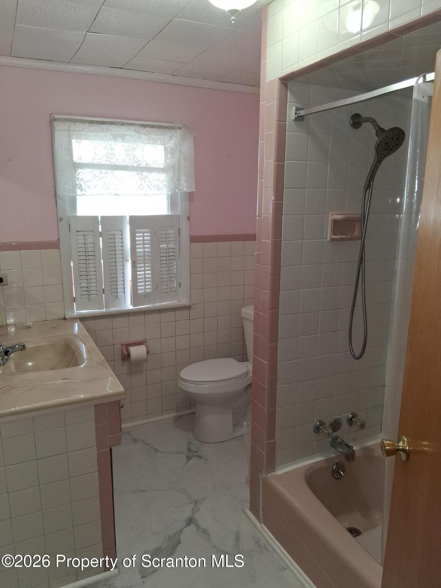 72 Welles Street Forty Fort, PA 18704 - Photo 30 of 37 a bathroom with a sink toilet and shower