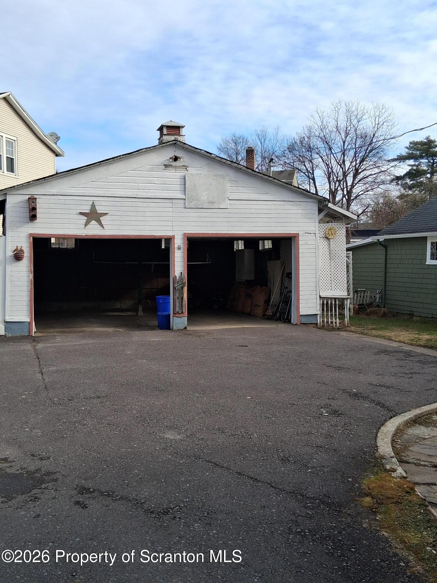 72 Welles Street Forty Fort, PA 18704 - Photo 4 of 37 a view of a car garage