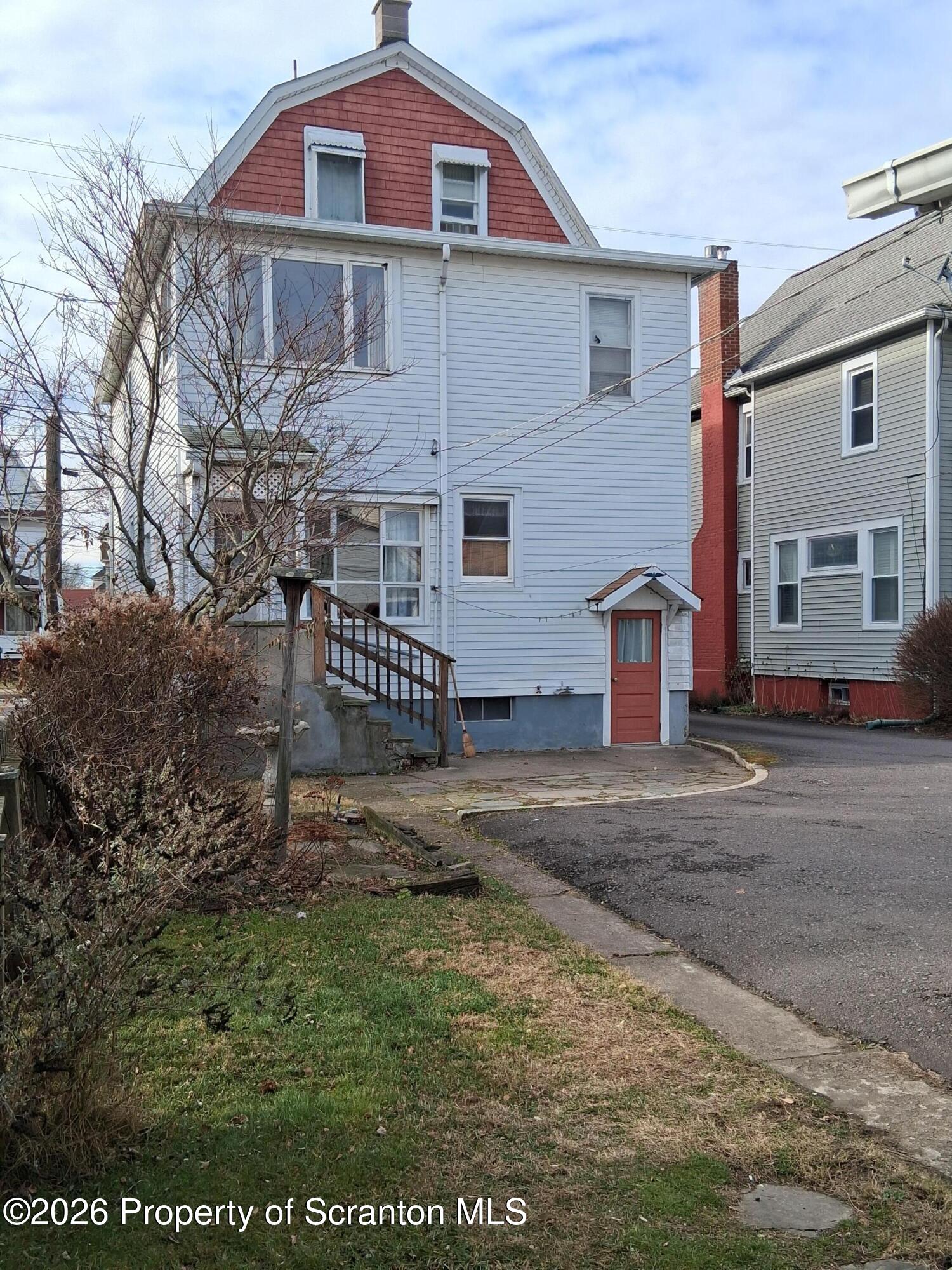 72 Welles Street Forty Fort, PA 18704 - Photo 6 of 37 a front view of a house with a yard