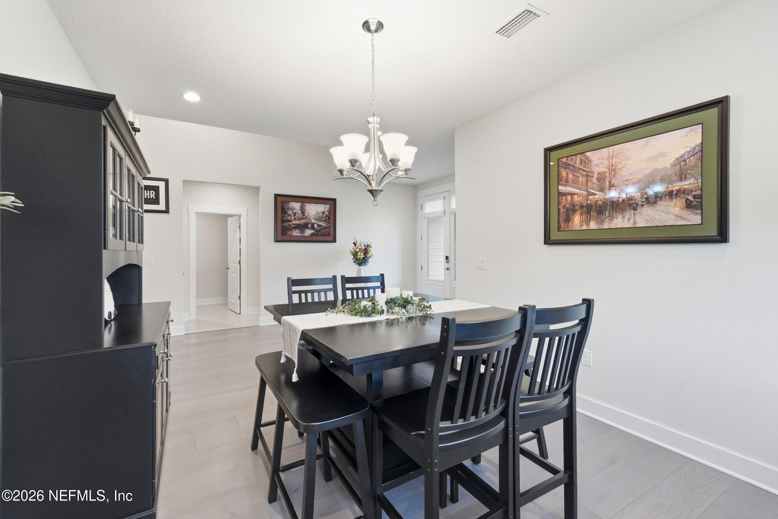 34 Red Rock Lane St. Johns, FL 32259 - Photo 9 of 71 a view of a dining room with furniture and chandelier
