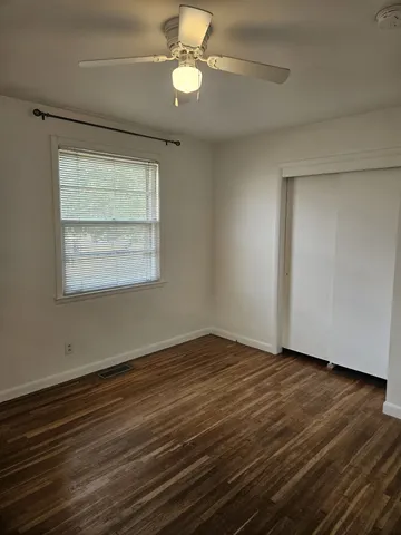 a bathroom with a sink a mirror and a toilet