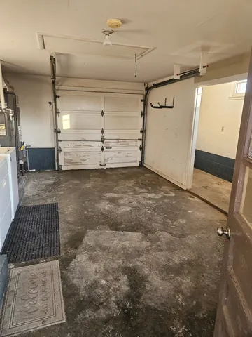 a backyard of a house with lots of green space and lake view