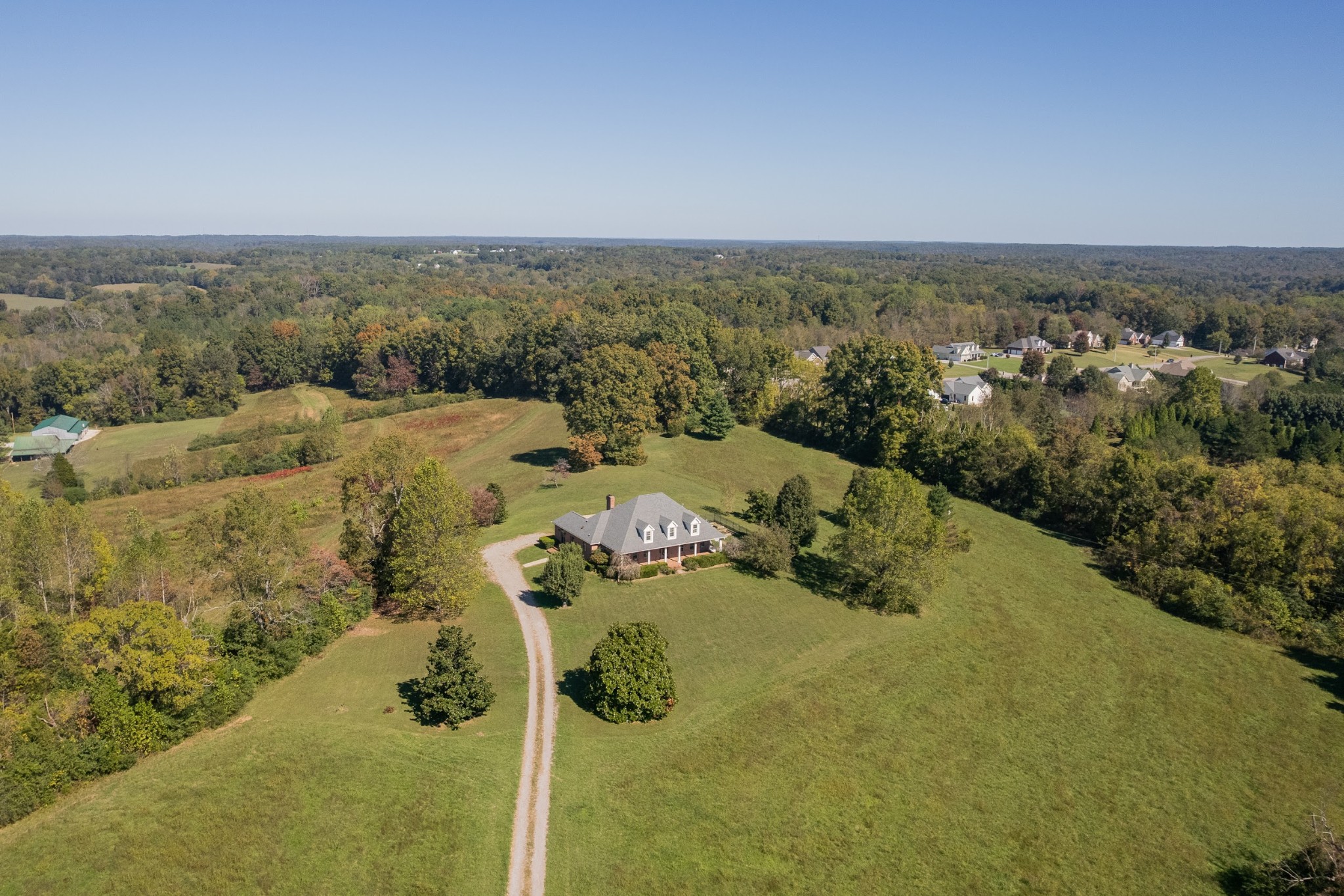 an aerial view of residential house with outdoor space