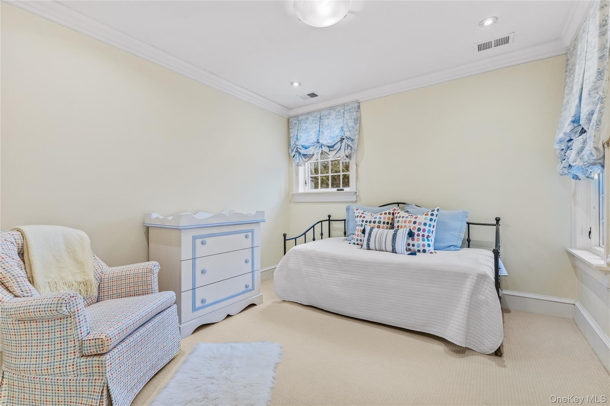 19 Park Drive South Rye, NY 10580 - Photo 29 of 42 Carpeted bedroom featuring crown molding and recessed lighting.