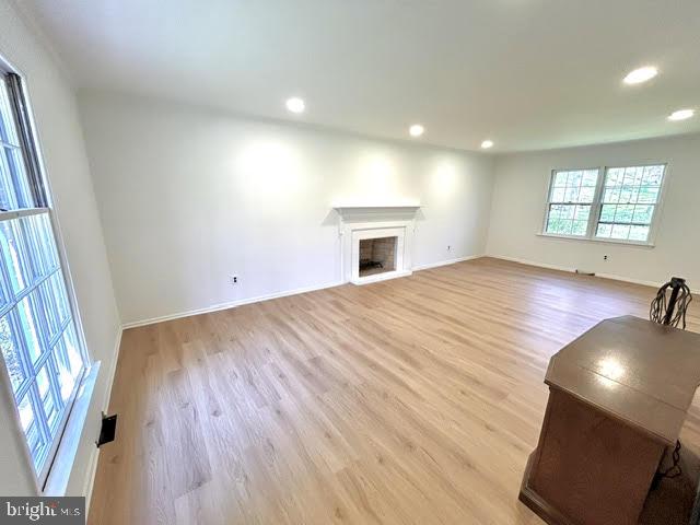 402 Norwood Road Downingtown, PA 19335 - Photo 11 of 21 an empty room with wooden floor and windows