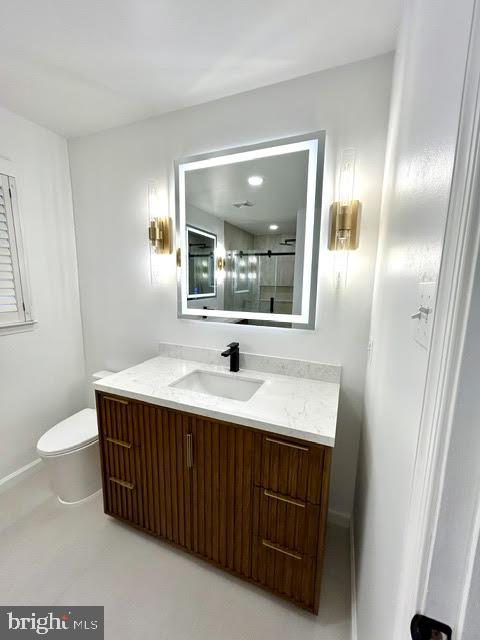 402 Norwood Road Downingtown, PA 19335 - Photo 12 of 21 a bathroom with a sink and a mirror