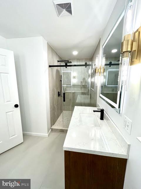 402 Norwood Road Downingtown, PA 19335 - Photo 16 of 21 a kitchen with a sink a refrigerator and cabinets