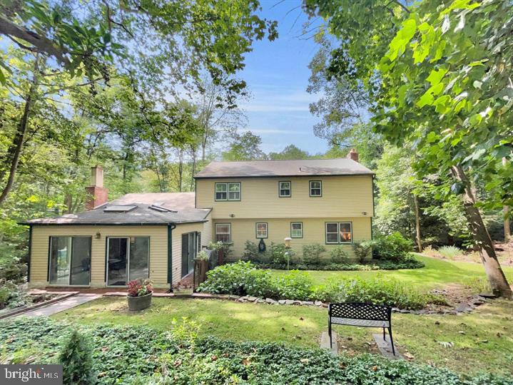 402 Norwood Road Downingtown, PA 19335 - Photo 21 of 21 front view of a house with a yard table and chairs