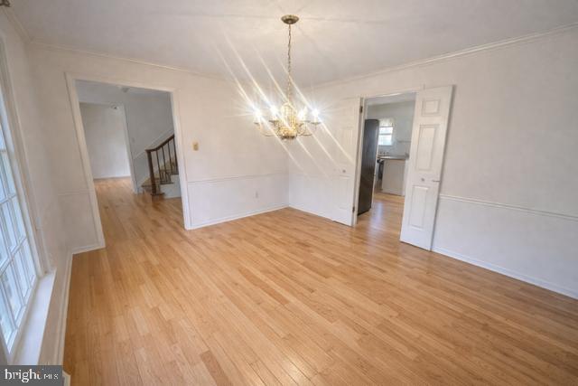 402 Norwood Road Downingtown, PA 19335 - Photo 4 of 22 a view of a livingroom with wooden floor and a large mirror