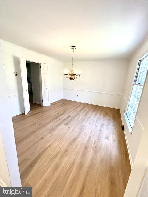 402 Norwood Road Downingtown, PA 19335 - Photo 8 of 21 wooden floor in an empty room with a window