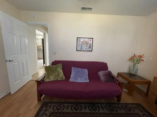 a bed room with a bed furniture and a window