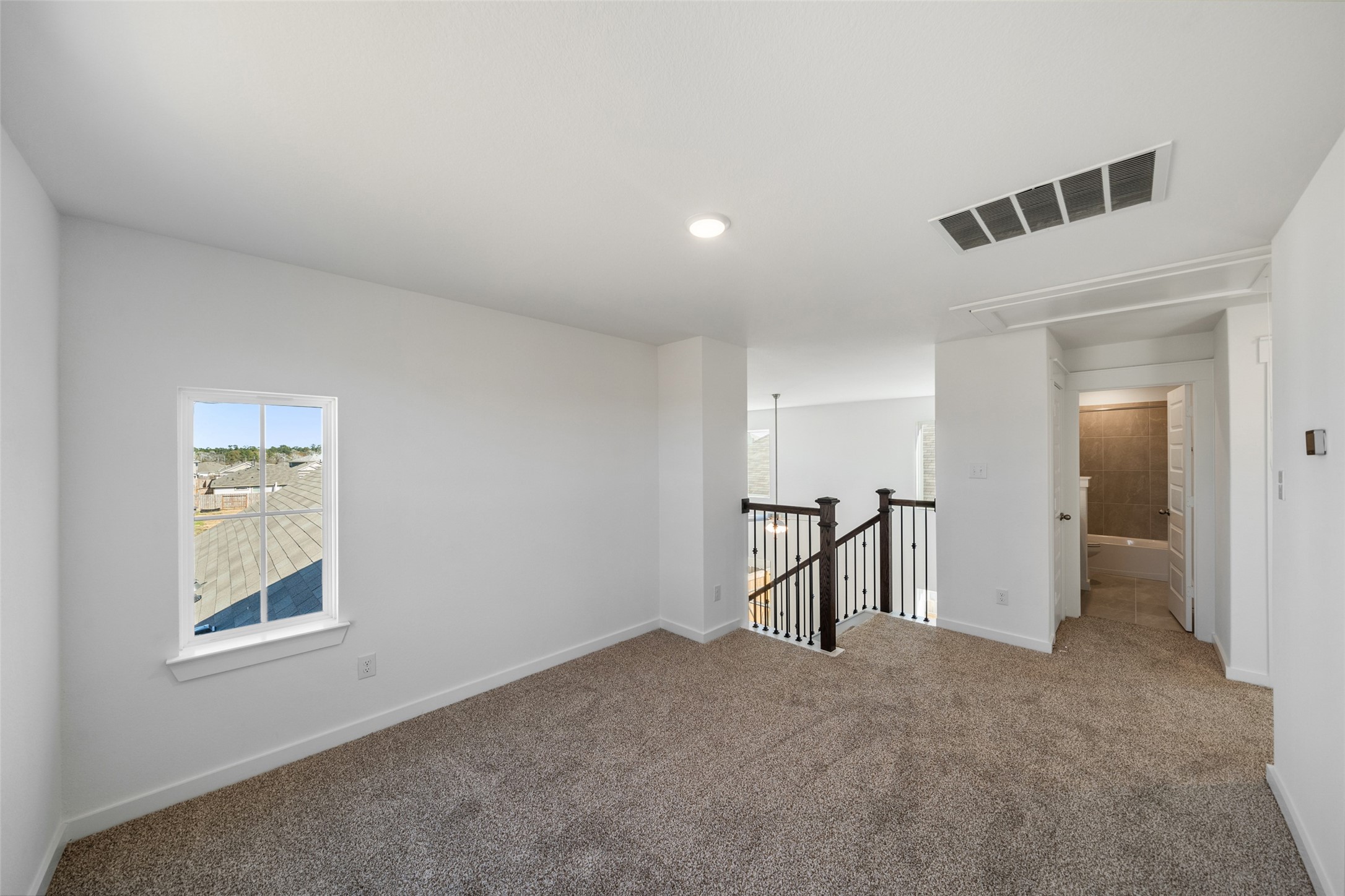 4418 Azalea Blossom Road Pinehurst, TX 77362 - Photo 29 of 31 High Ceilings, open and modern living room