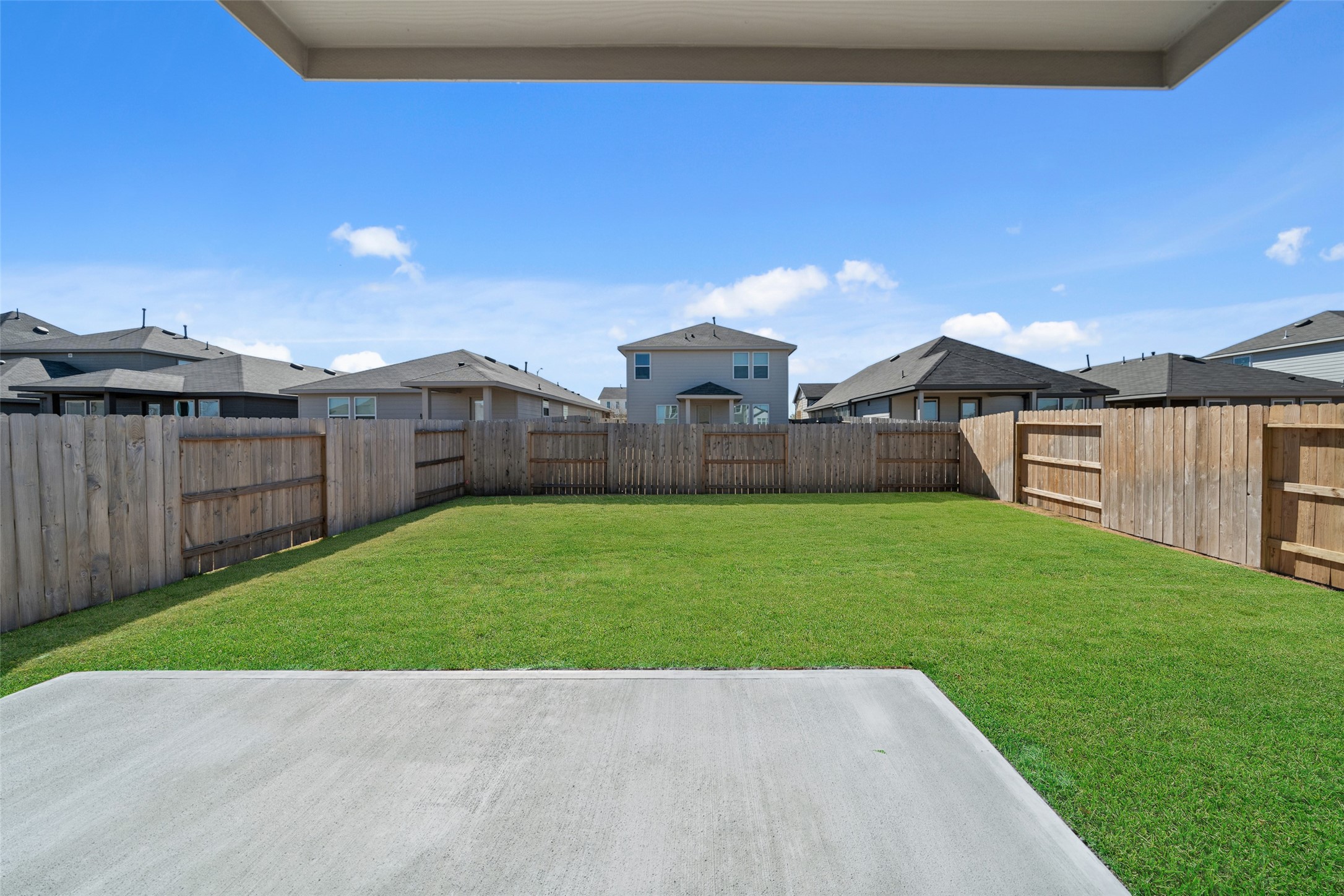4418 Azalea Blossom Road Pinehurst, TX 77362 - Photo 4 of 31 Large backyard and patio