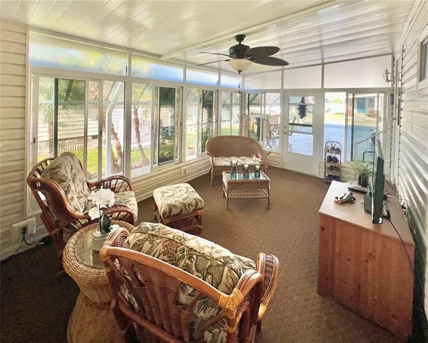 a kitchen with stainless steel appliances granite countertop a sink a stove and cabinets