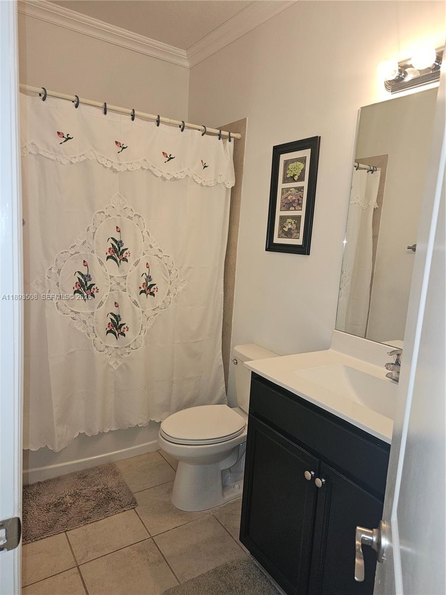 18964 Southwest 135th Avenue Miami, FL 33177 - Photo 12 of 39 a bathroom with a sink toilet and shower