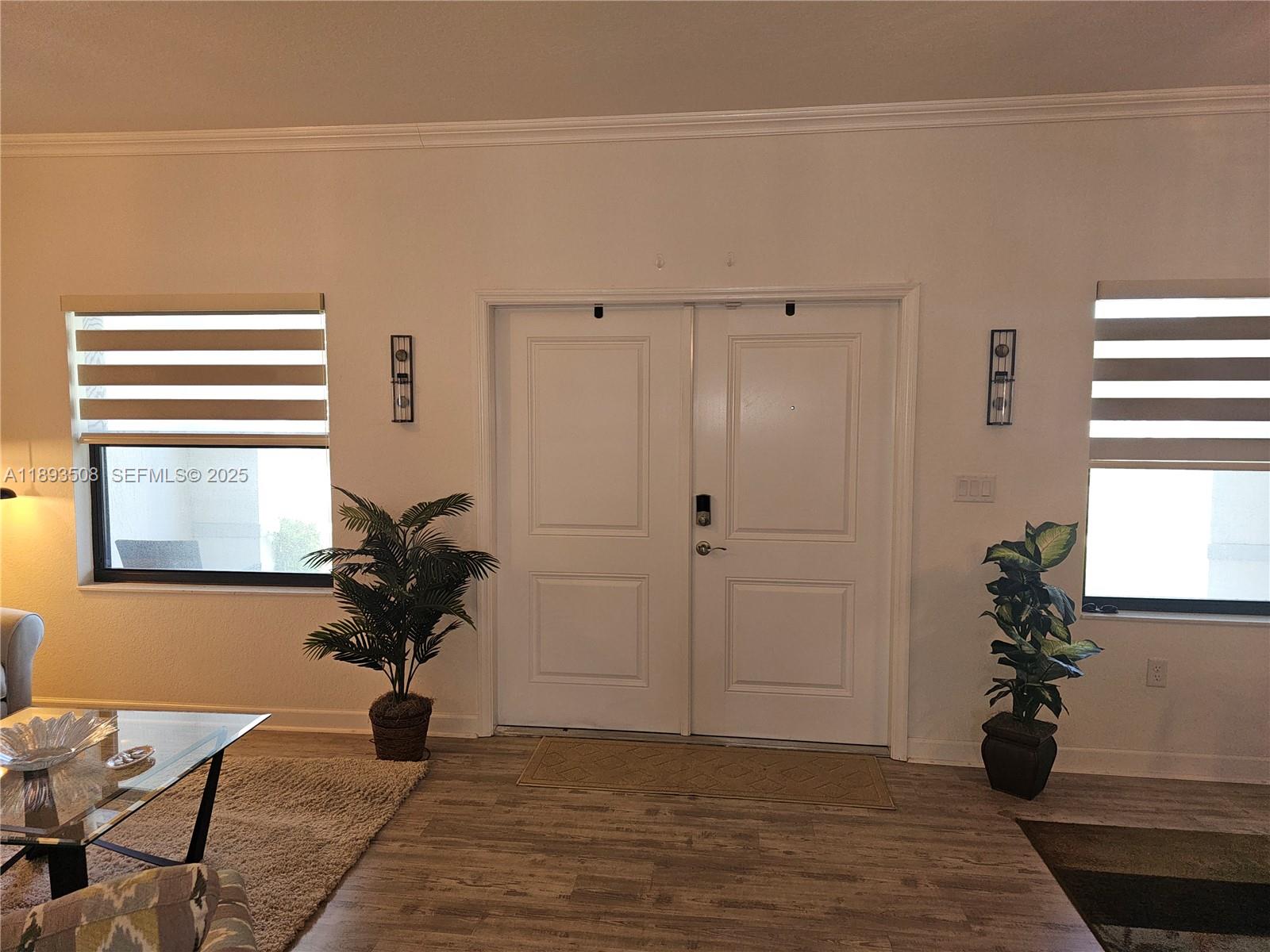 18964 Southwest 135th Avenue Miami, FL 33177 - Photo 14 of 39 a view of a room that has a bed and a window in it