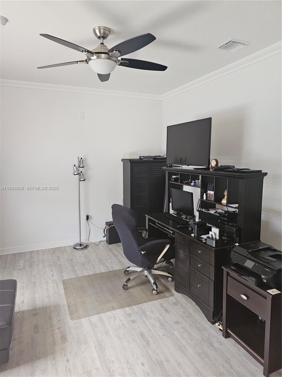 18964 Southwest 135th Avenue Miami, FL 33177 - Photo 19 of 39 a view of a workspace with furniture