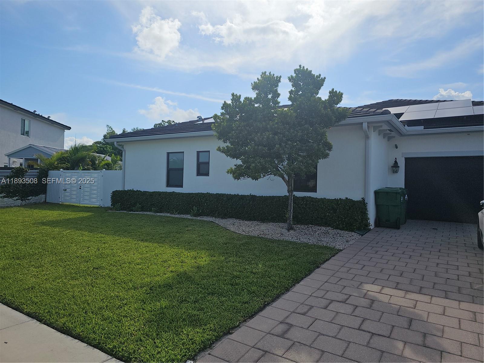 18964 Southwest 135th Avenue Miami, FL 33177 - Photo 31 of 39 a view of a backyard of the house