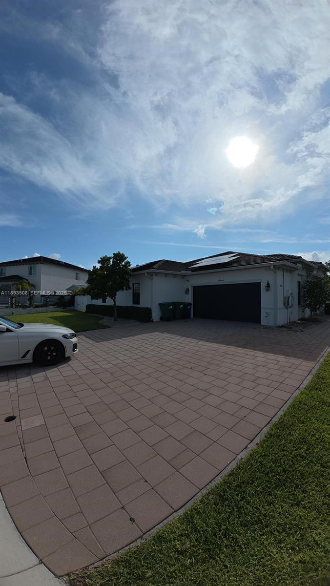 18964 Southwest 135th Avenue Miami, FL 33177 - Photo 4 of 39 a view of outdoor space yard and entertaining space