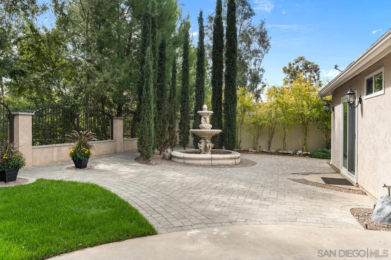 11837 La Colina Road San Diego, CA 92131 - Photo 27 of 35 a view of a park with iron fence
