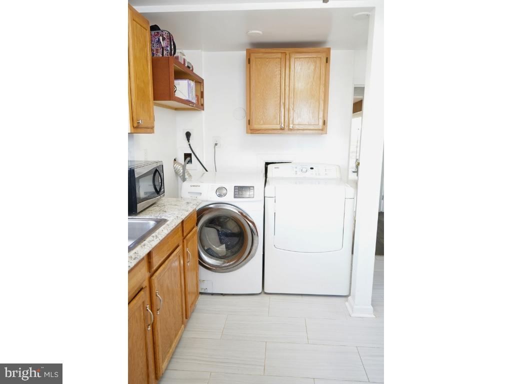 12826 Glynis Road Clinton, MD 20735 - Photo 25 of 47 Laundry Area