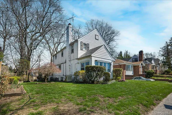 $999,900 | Utopia Parkway | Jamaica Estates