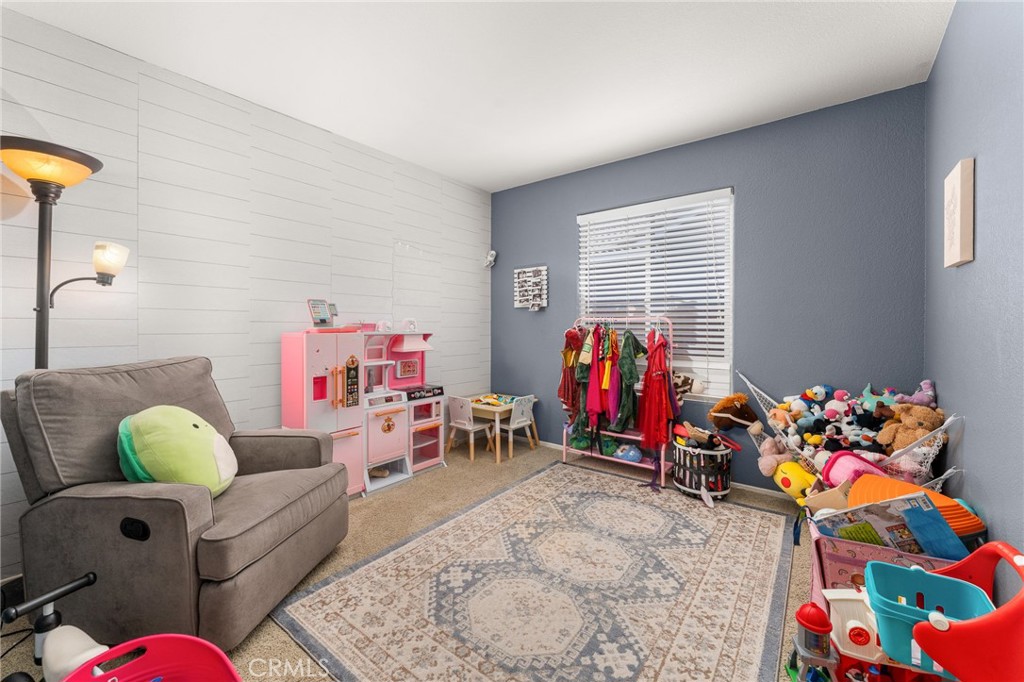 533 Heidi Circle Beaumont, CA 92223 - Photo 17 of 37 a living room with furniture and baby toys