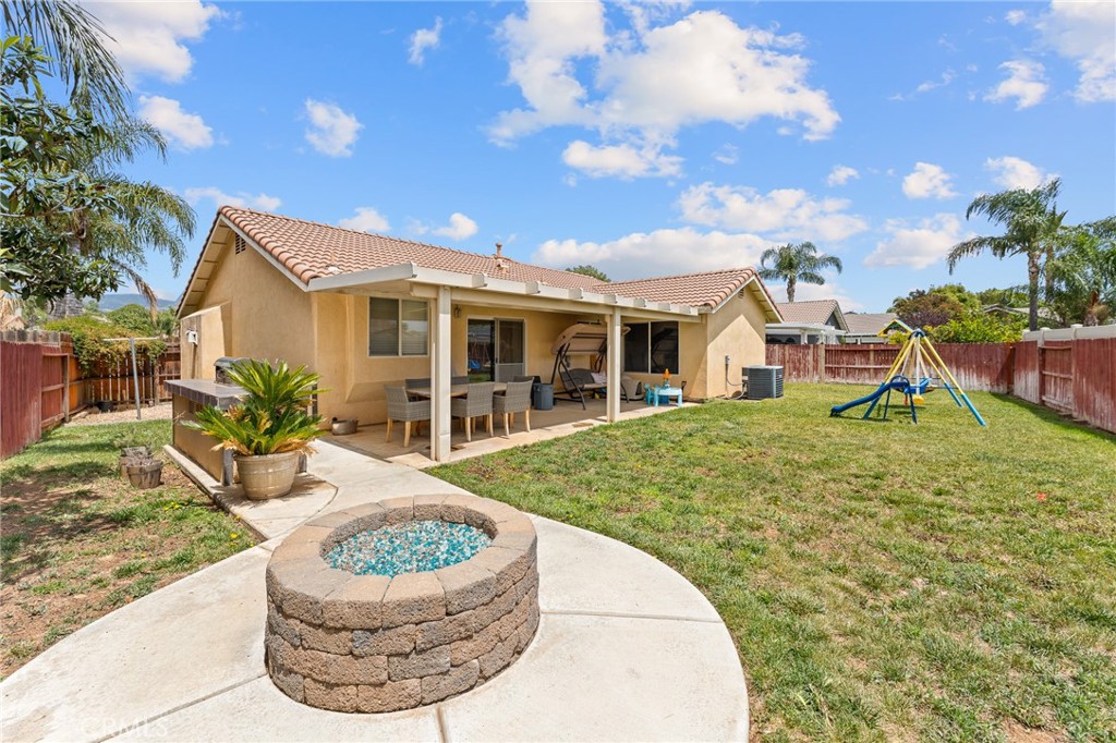 533 Heidi Circle Beaumont, CA 92223 - Photo 22 of 37 a view of a house with backyard and sitting area
