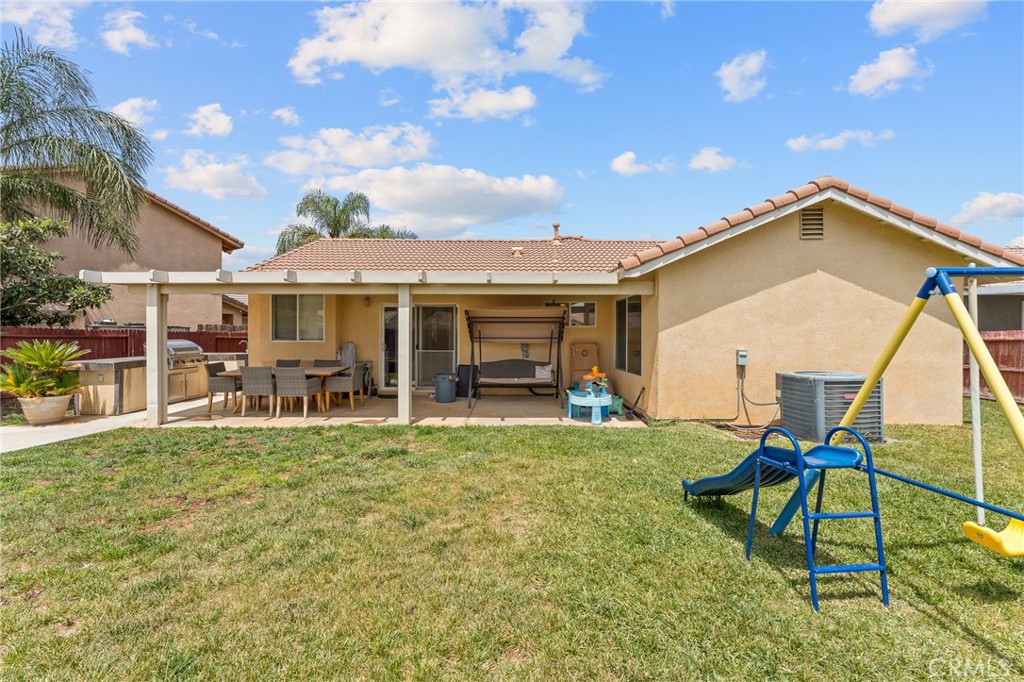 533 Heidi Circle Beaumont, CA 92223 - Photo 23 of 37 a view of a house with backyard porch and sitting area