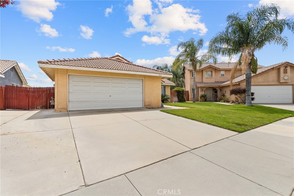 533 Heidi Circle Beaumont, CA 92223 - Photo 29 of 37 a front view of a house with a yard and garage