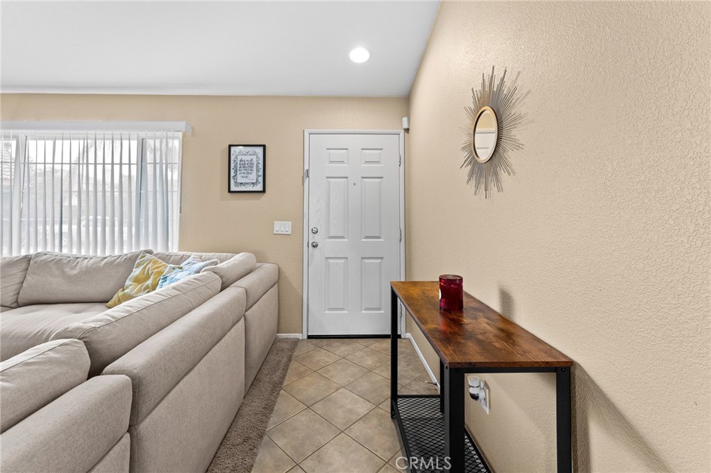 533 Heidi Circle Beaumont, CA 92223 - Photo 5 of 37 a living room with furniture and a window
