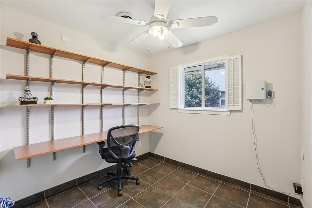 3237 Timberview Road Dallas, TX 75229 - Photo 20 of 30 Built-in desk and shelving — ready for remote work