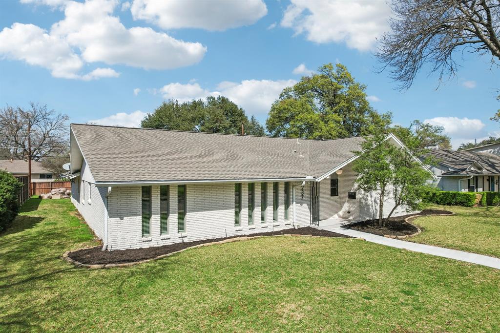 3237 Timberview Road Dallas, TX 75229 - Photo 25 of 30 Side elevation showcasing signature tall windows