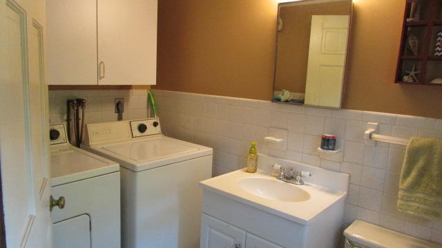 43 Chappaquiddick Road Centerville, MA 02632 - Photo 7 of 8 a utility room with dryer and washer