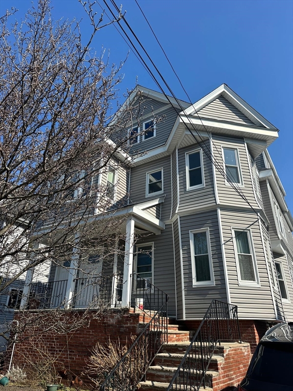 9 Henry Street, Unit 2 Everett, MA 02149 - Photo 19 of 19 a front view of a house