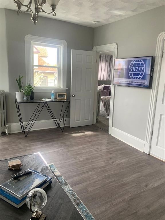 9 Henry Street, Unit 2 Everett, MA 02149 - Photo 6 of 19 a room with storage and utility