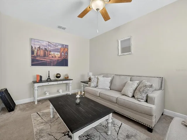 a living room with furniture and a couch