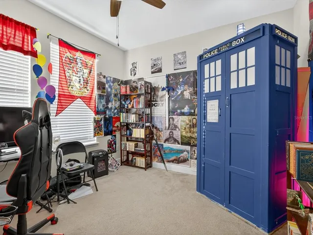 a view of a workspace with furniture