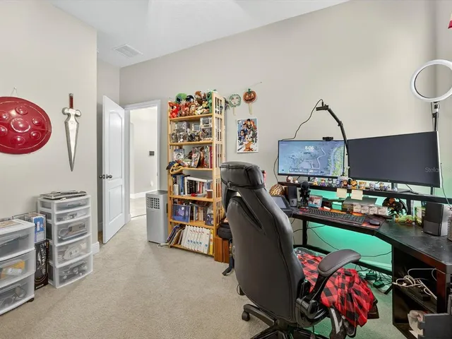 a view of a workspace with furniture