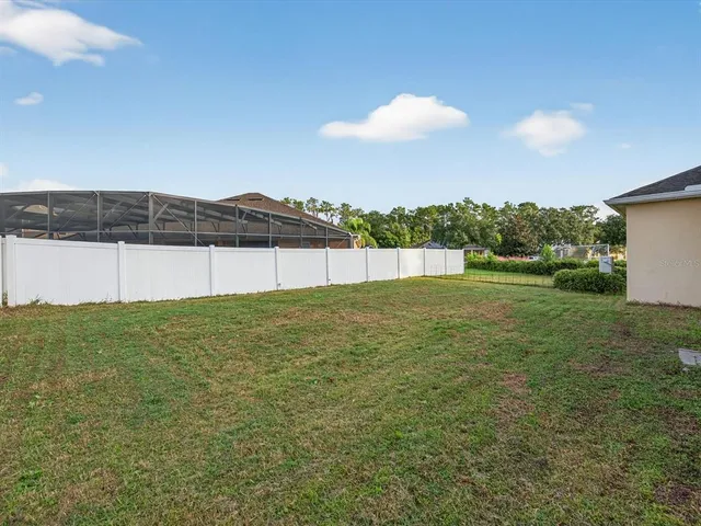 a view of outdoor space and yard