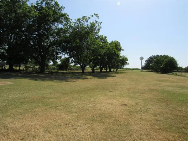 a view of outdoor space with deck and yard