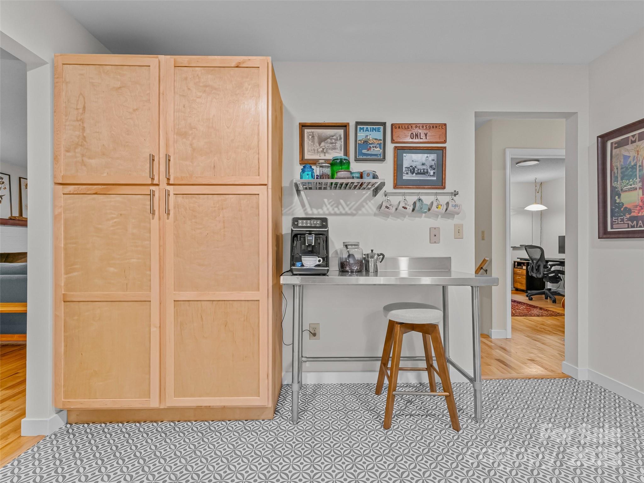 197 Tiptop Road Brevard, NC 28712 - Photo 17 of 45 a living room with stainless steel appliances furniture a rug and a window