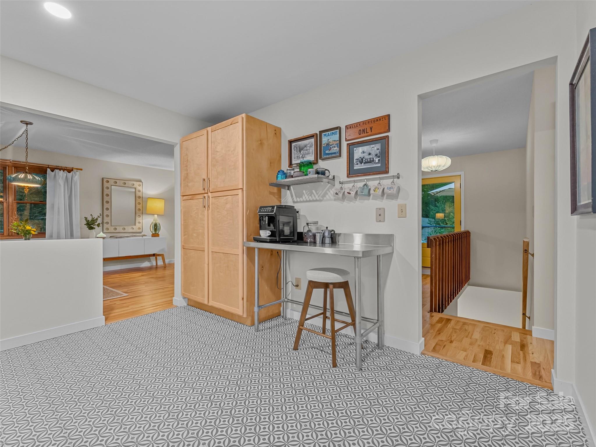 197 Tiptop Road Brevard, NC 28712 - Photo 18 of 45 a kitchen with stainless steel appliances a refrigerator and a stove top oven