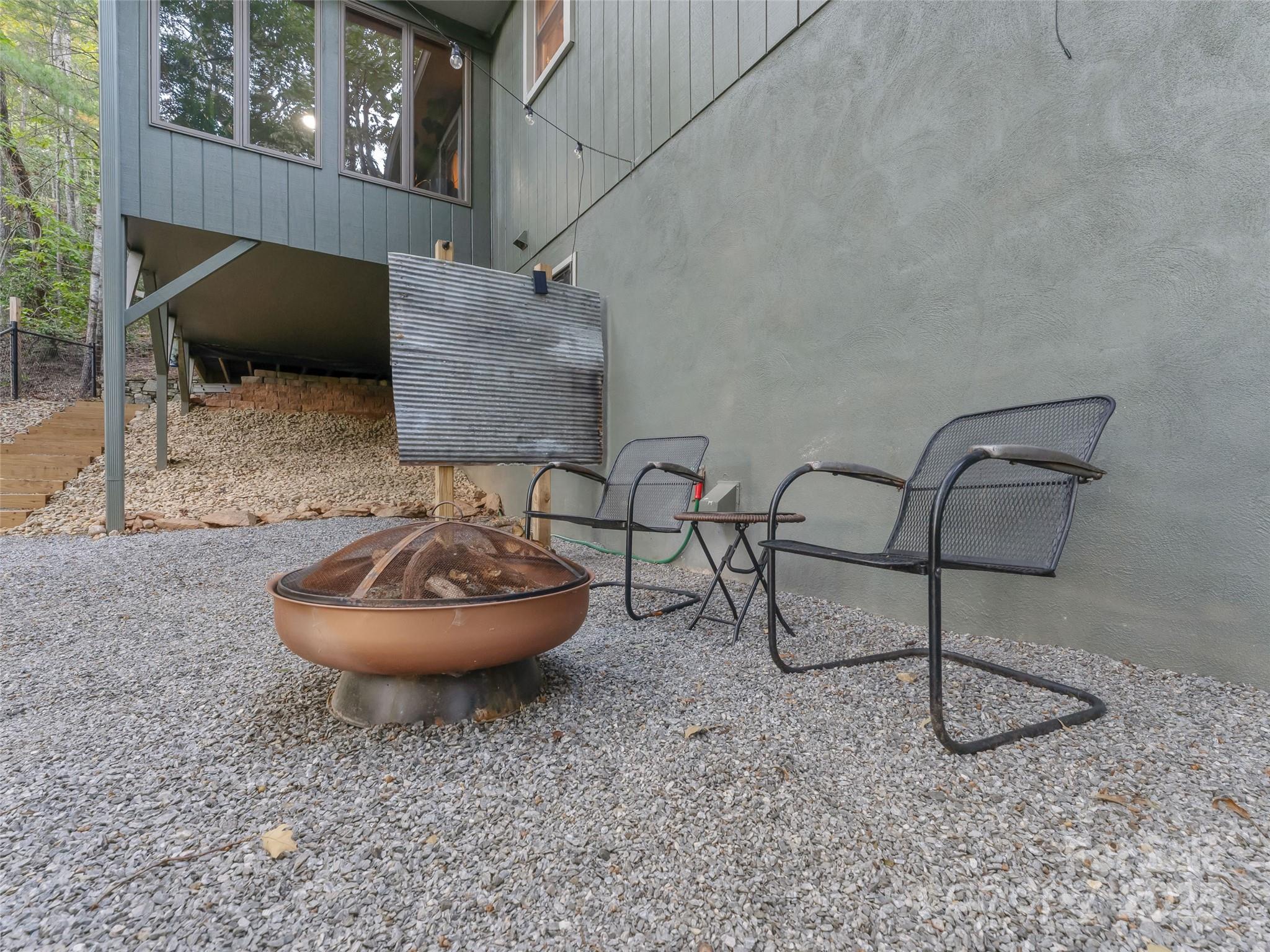 197 Tiptop Road Brevard, NC 28712 - Photo 40 of 45 a room with furniture and a potted plant